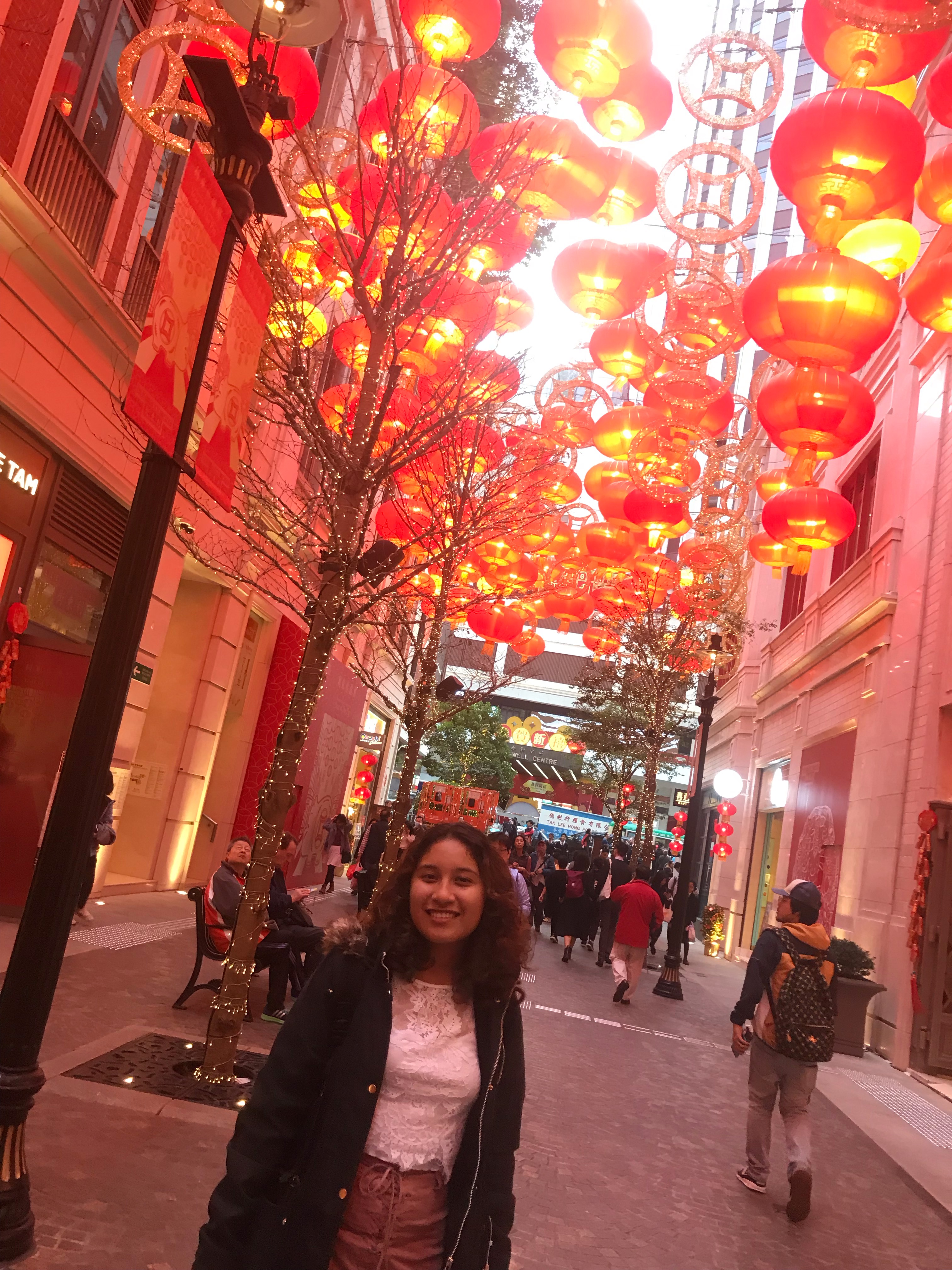 Chinese New Year  My roommate and I were exploring Hong Kong when we came out from the station in a neighborhood called Wan Chai. The street was filled with red decorations to welcome Chinese New Year