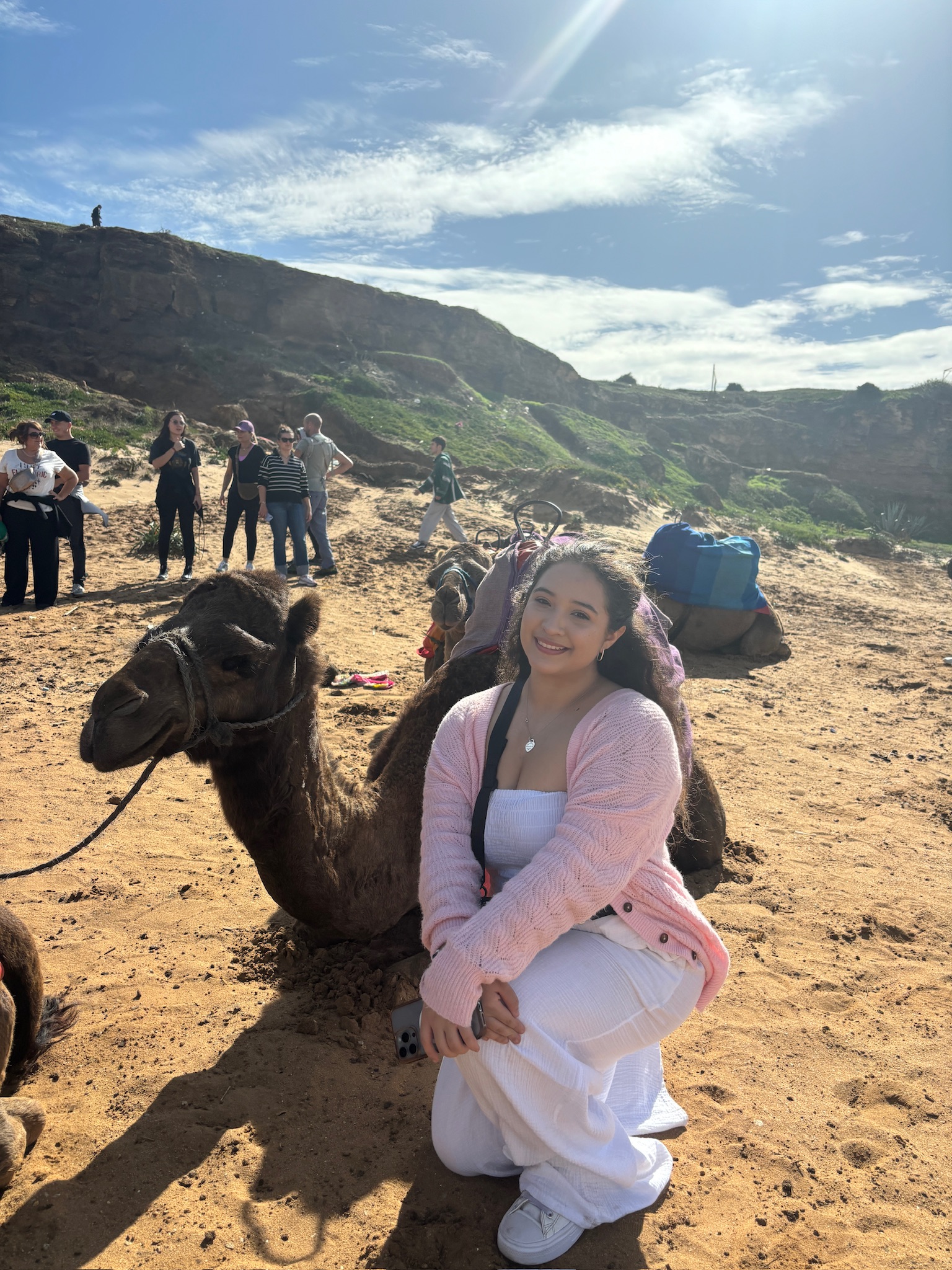 Hazel and her favorite baby camel in Morocco, Africa