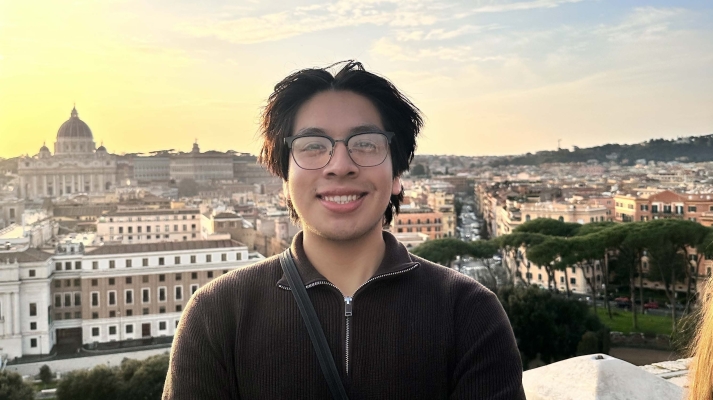 Leonardo standing on the Castel Sant'angelo terrace overlooking Vatican City