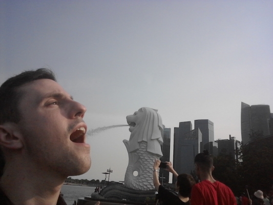 Spencer at the famous Singapore Merlion