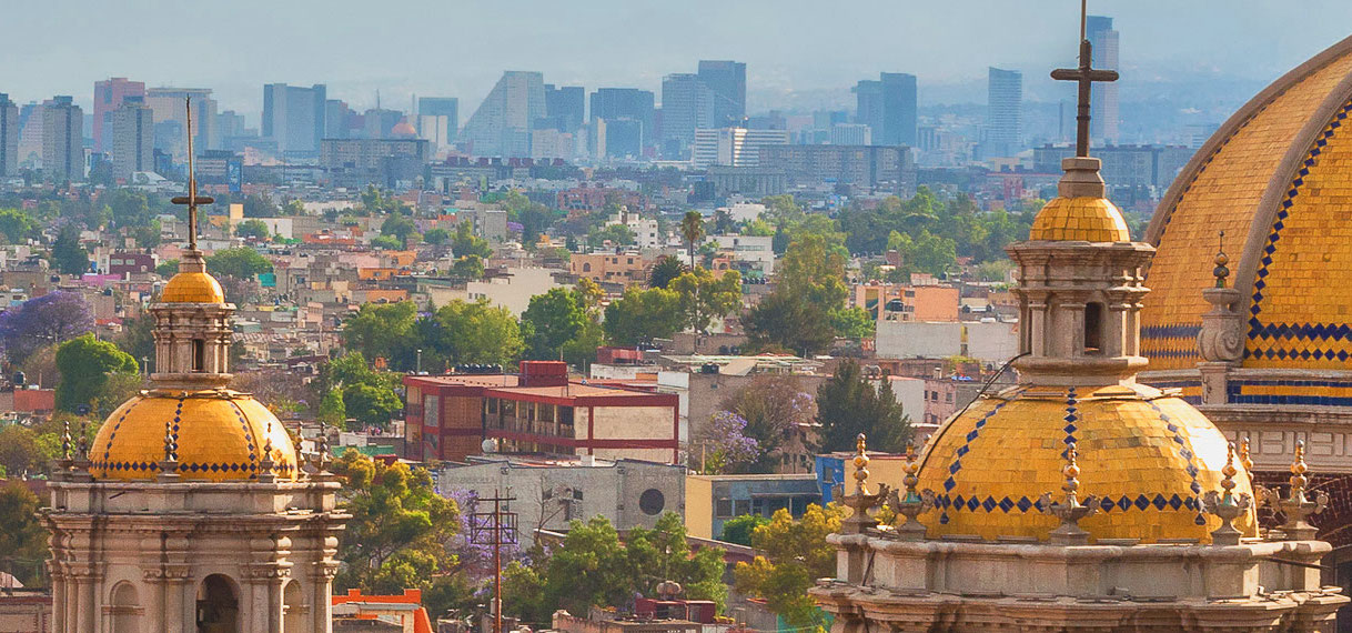 Scenic view at Basilica of Guadalupe with Mexico city skyline